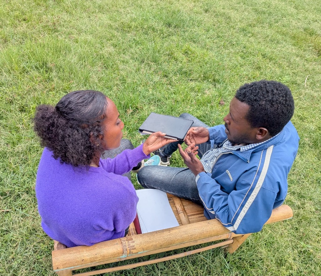 Enumerator recording a farmer’s answers during the Sikia field deployment in Ethiopia